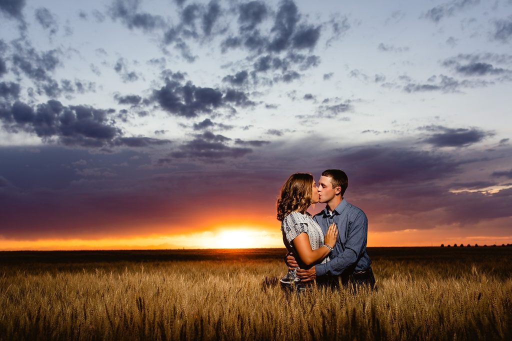 Colorado Engagement Photographer, Colorado Wedding Photographer, Colorado Farm Engagement Photographer, Colorado Farm Wedding Photographer, Keenesburg Wedding Photographer, Keenesburg Engagement Photographer, Colorado Wheat Harvest Engagement Photographer, Engagement Photos in Colorado Fields, Colorado Country Engagement Photographer, Brush Engagement Photographer, Brush Wedding Photographer, Bennett Wedding Photographer, Bennett Engagement Photographer, Denver Engagement Photographer