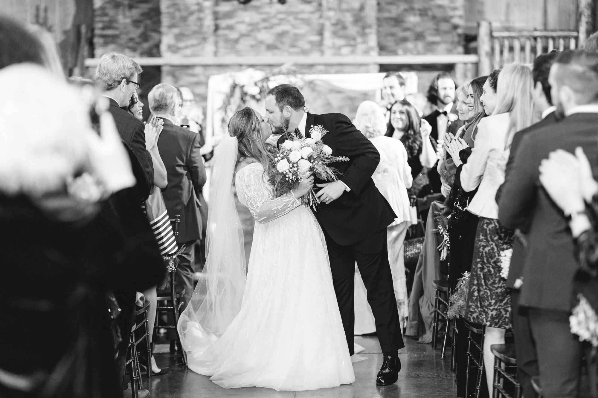 Indoor wedding ceremony at lower spruce mountain ranch winter wedding