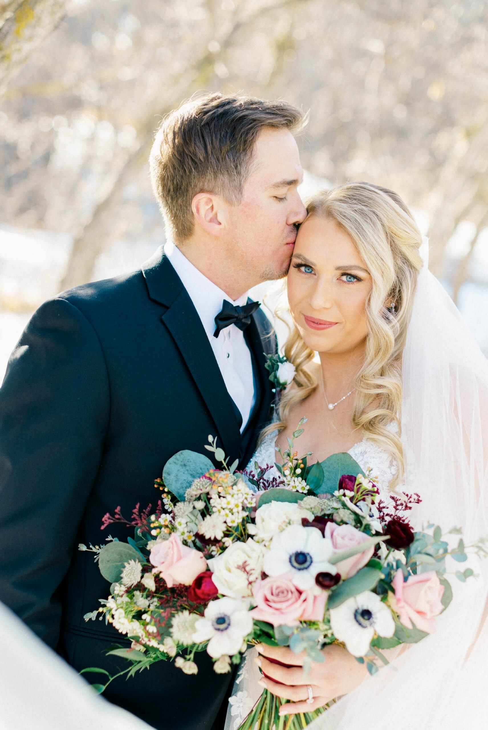 Portrait of a groom and a bride at a Winter wedding in Colorado Springs